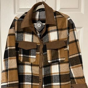 Plaid shacket with corduroy collar.